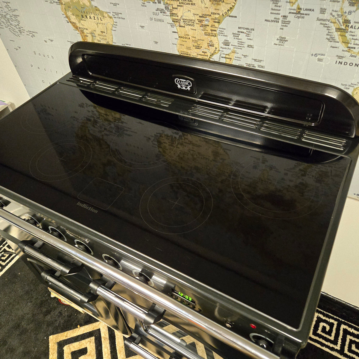 Rangemaster Classic Deluxe Induction Range Cooker in Black and Chrome 110cm