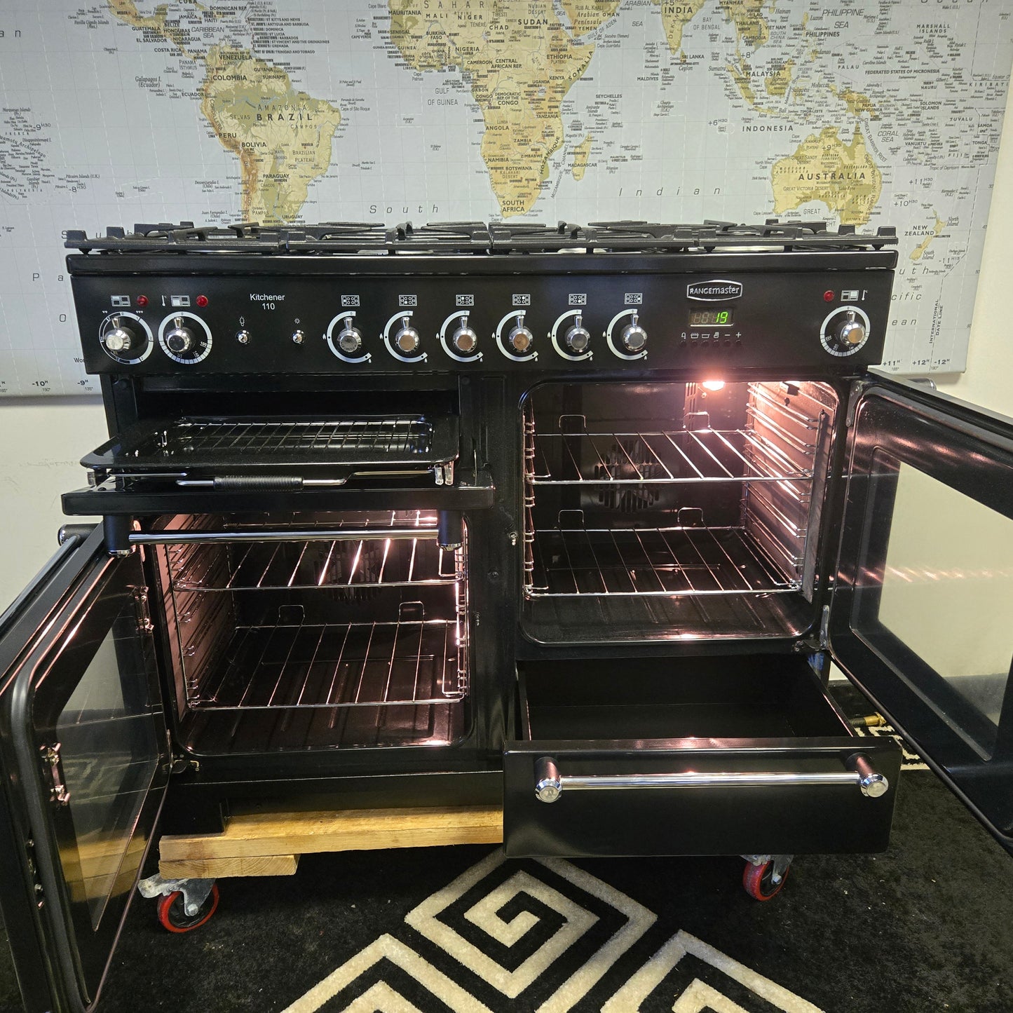 Rangemaster Kitchener Dual Fuel Range Cooker in Black with a Chrome Trim 110cm