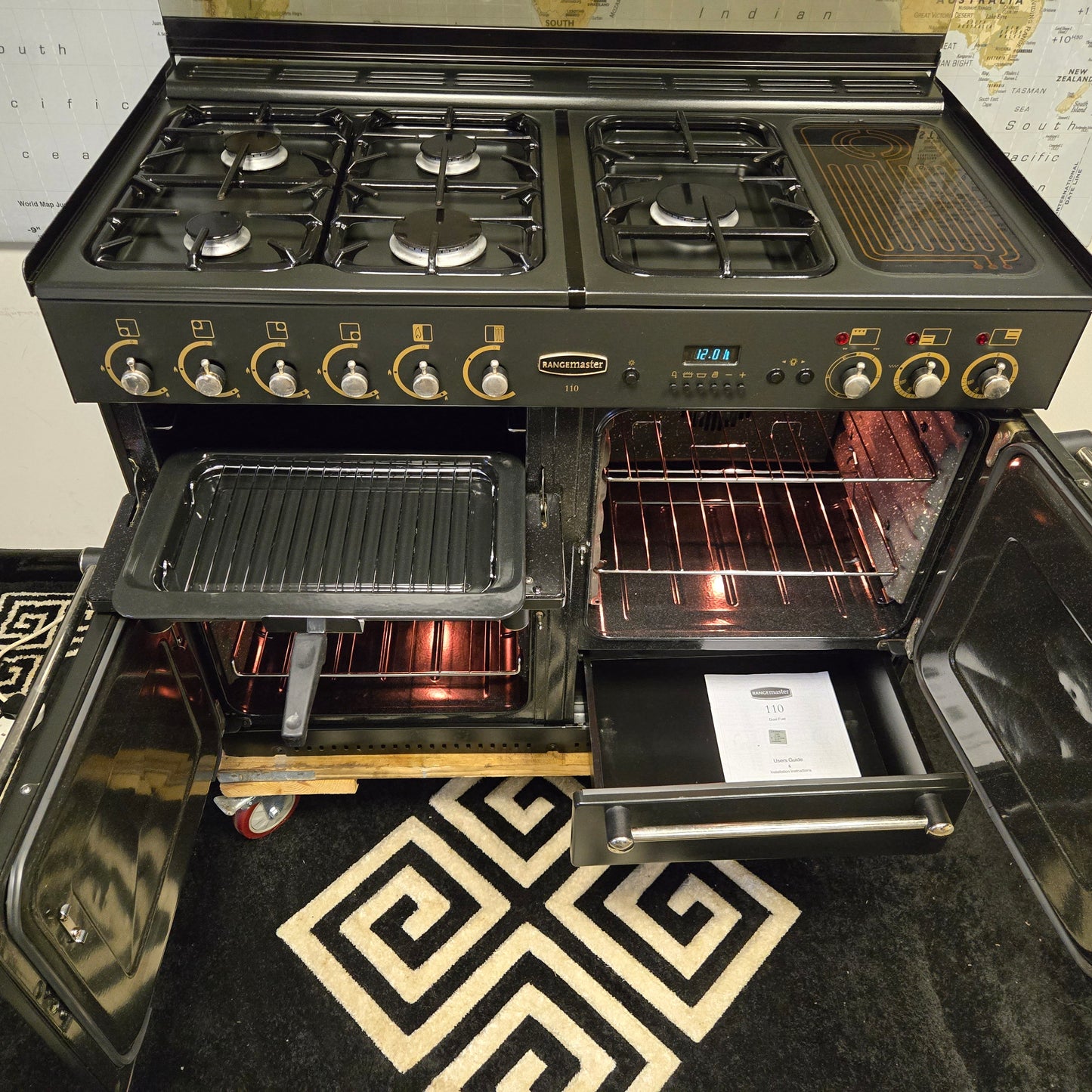 Rangemaster 110 Dual Fuel Range Cooker in Black 110cm with a Lid / Splashback
