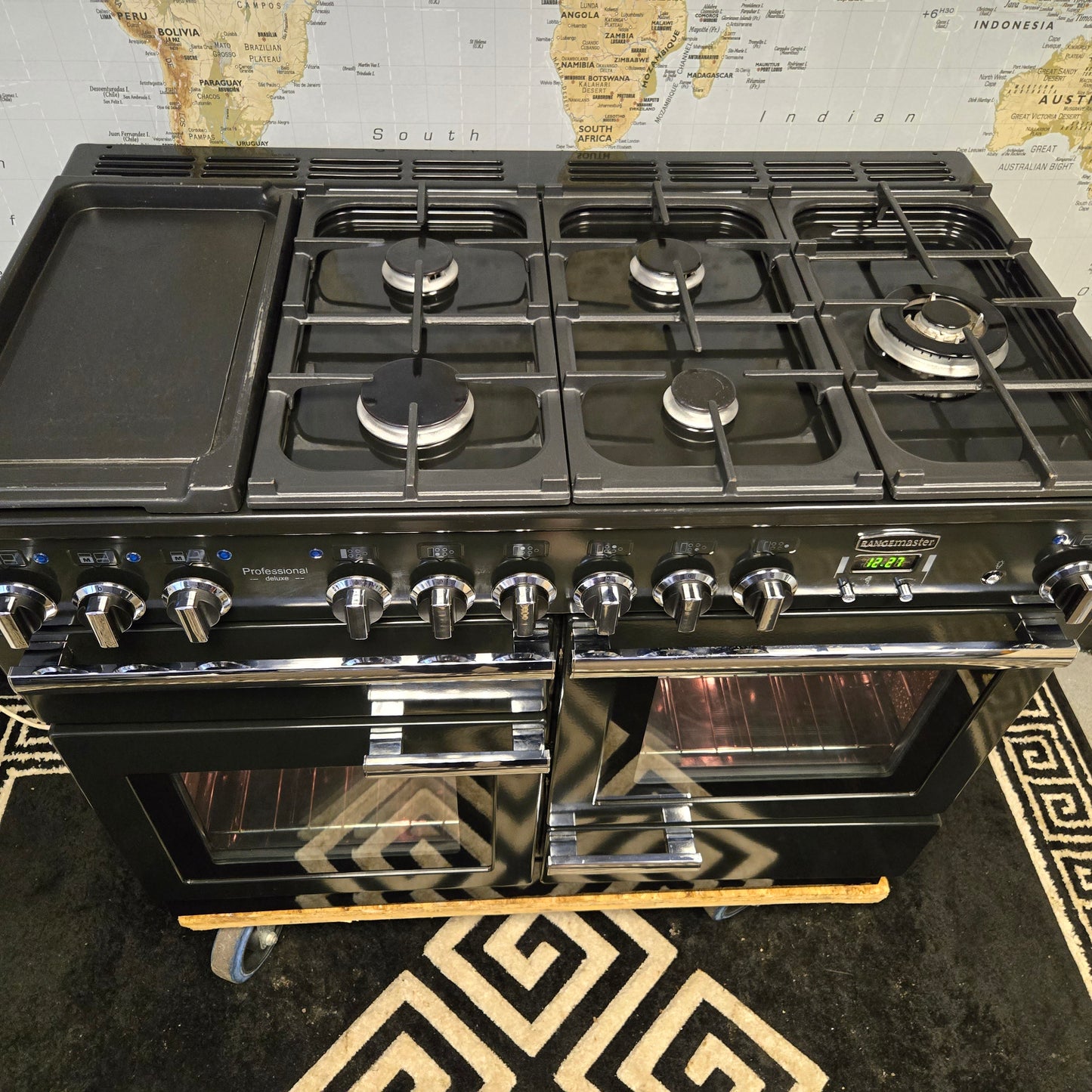 Rangemaster Professional Deluxe Dual Fuel Range Cooker in Black with a Chrome Trim 110cm