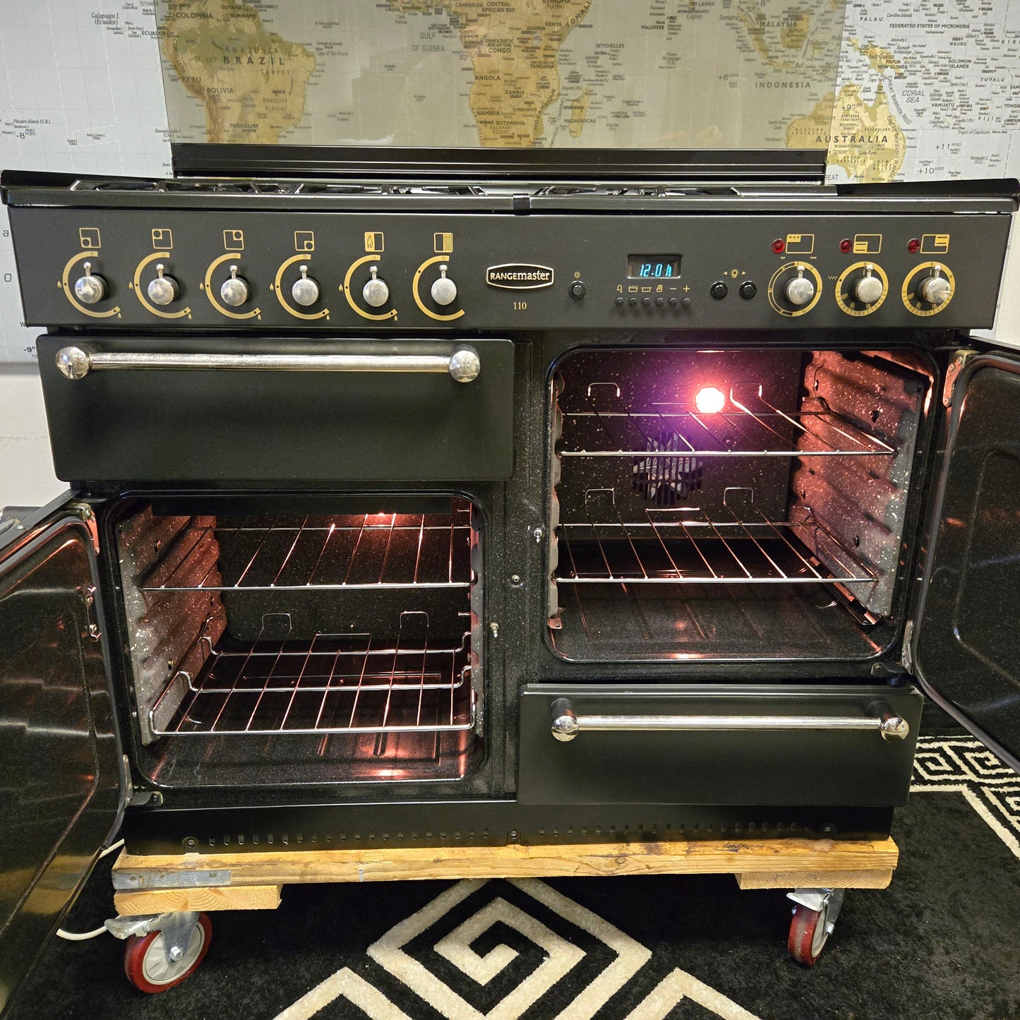 Rangemaster 110 Dual Fuel Range Cooker in Black 110cm with a Lid / Splashback