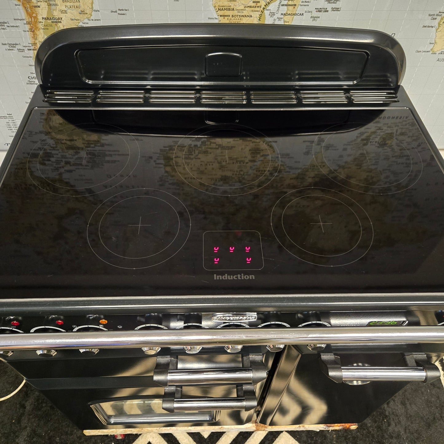 Rangemaster Classic Deluxe Induction Range Cooker in Black with a Chrome Trim 90cm