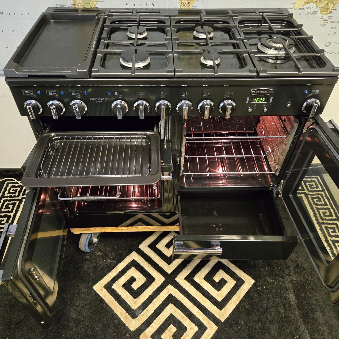 Rangemaster Professional Deluxe Dual Fuel Range Cooker in Black with a Chrome Trim 110cm