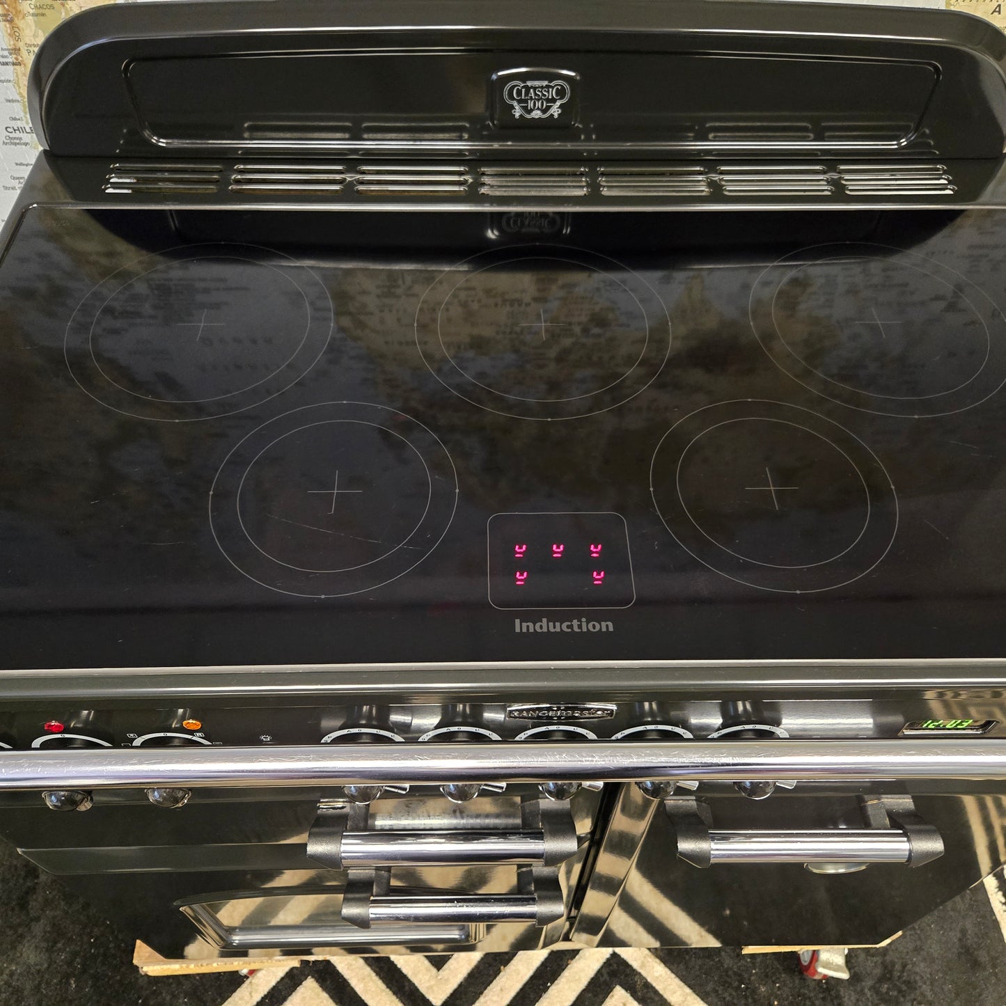 Rangemaster Classic Deluxe Induction Range Cooker in Black with a Chrome Trim 100cm