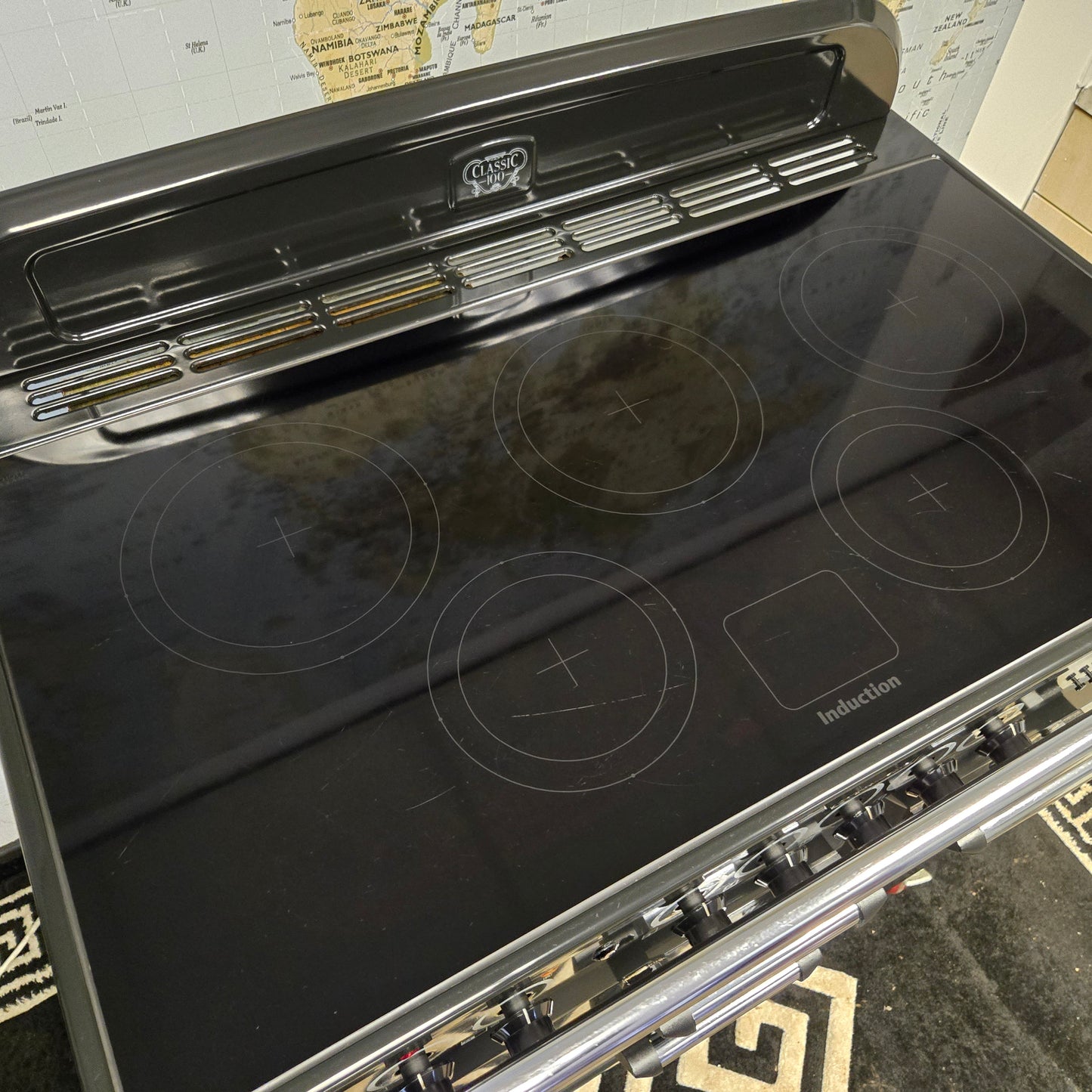 Rangemaster Classic Deluxe Induction Range Cooker in Black with a Chrome Trim 100cm