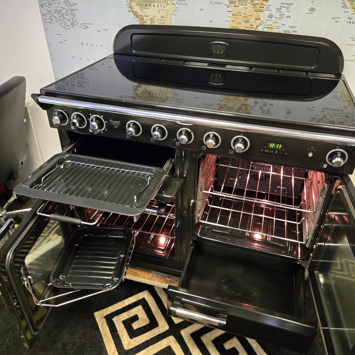 Rangemaster Classic Deluxe Induction Range Cooker in Black and Chrome 110cm