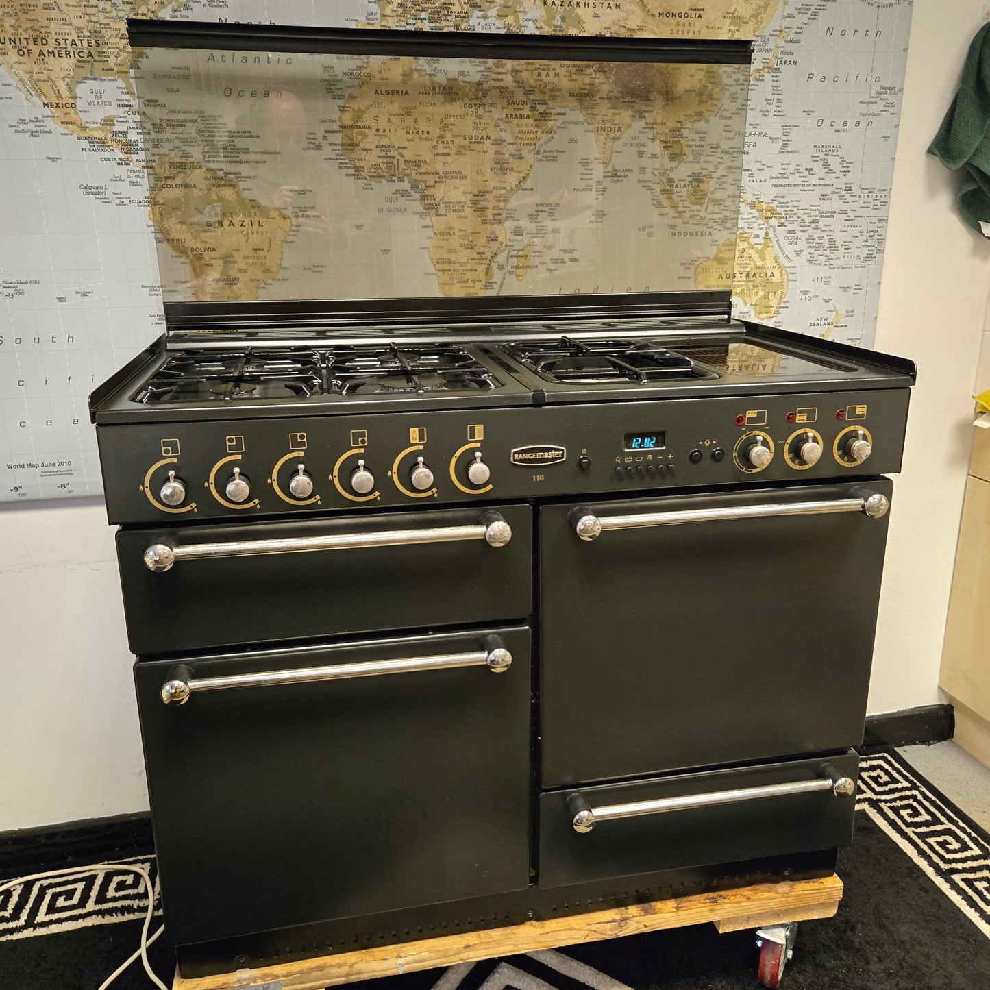 Rangemaster 110 Dual Fuel Range Cooker in Black 110cm with a Lid / Splashback