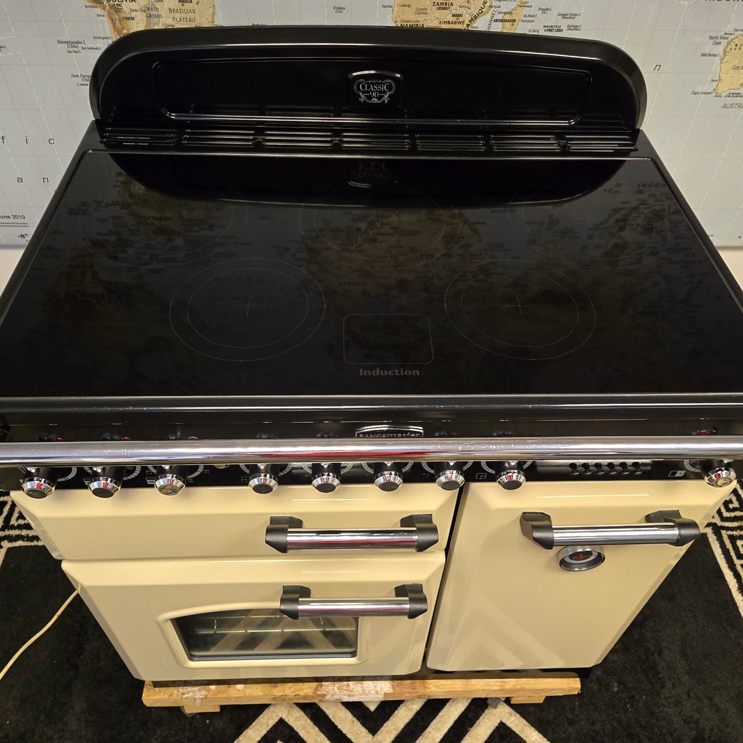 Rangemaster Classic Deluxe Induction Range Cooker in Cream and Chrome 90cm