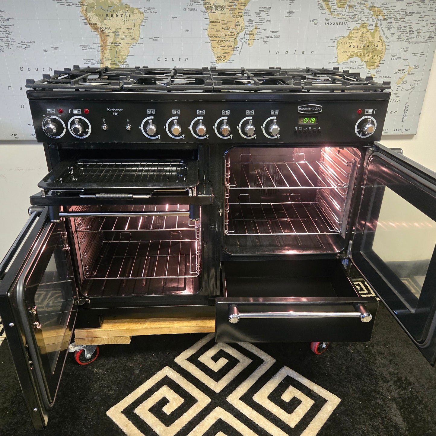 Rangemaster Kitchener Dual Fuel Range Cooker in Black with a Chrome Trim 110cm